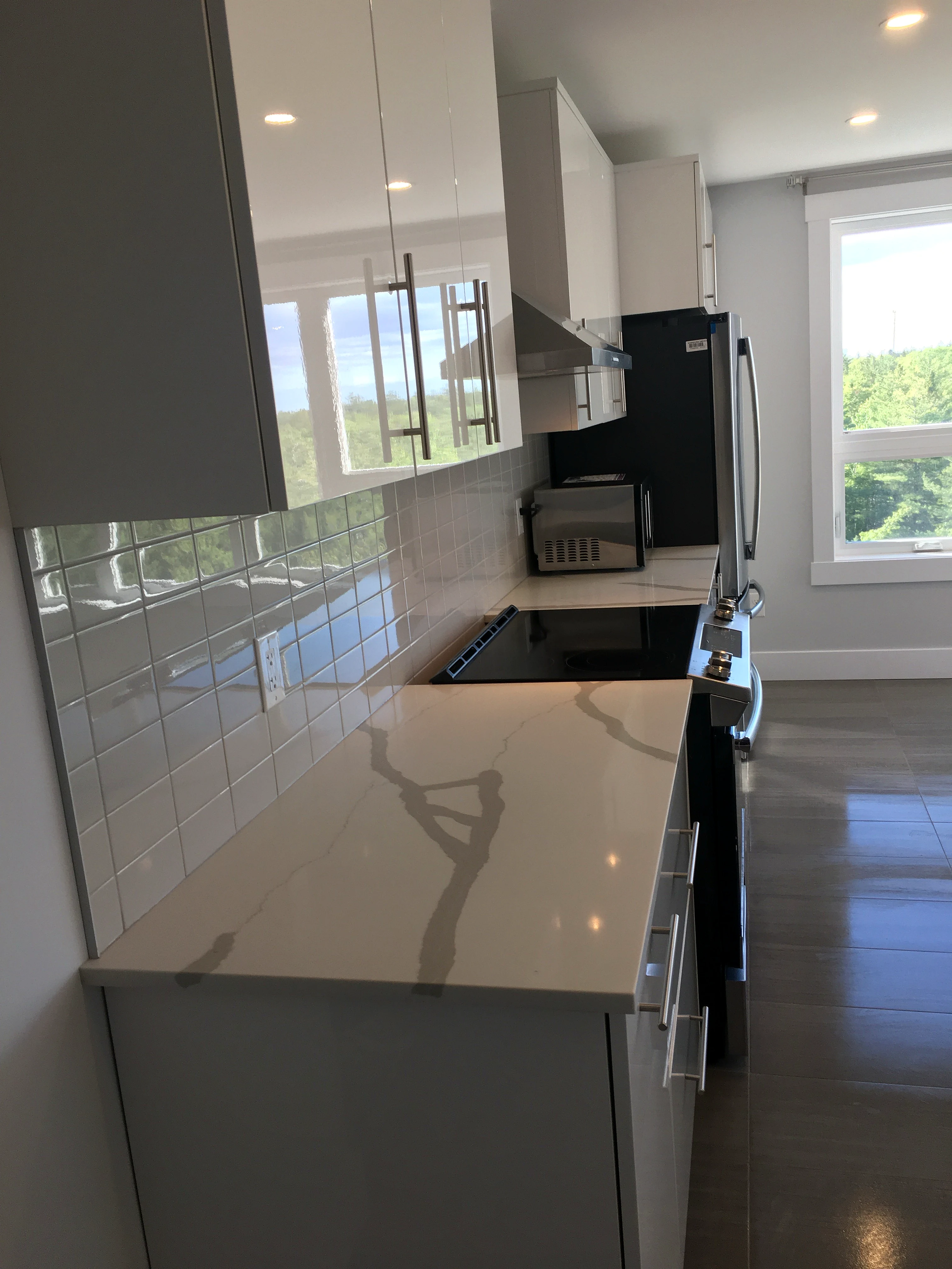 Glossy quartz kitchen cleaned for a Halifax peninsula home